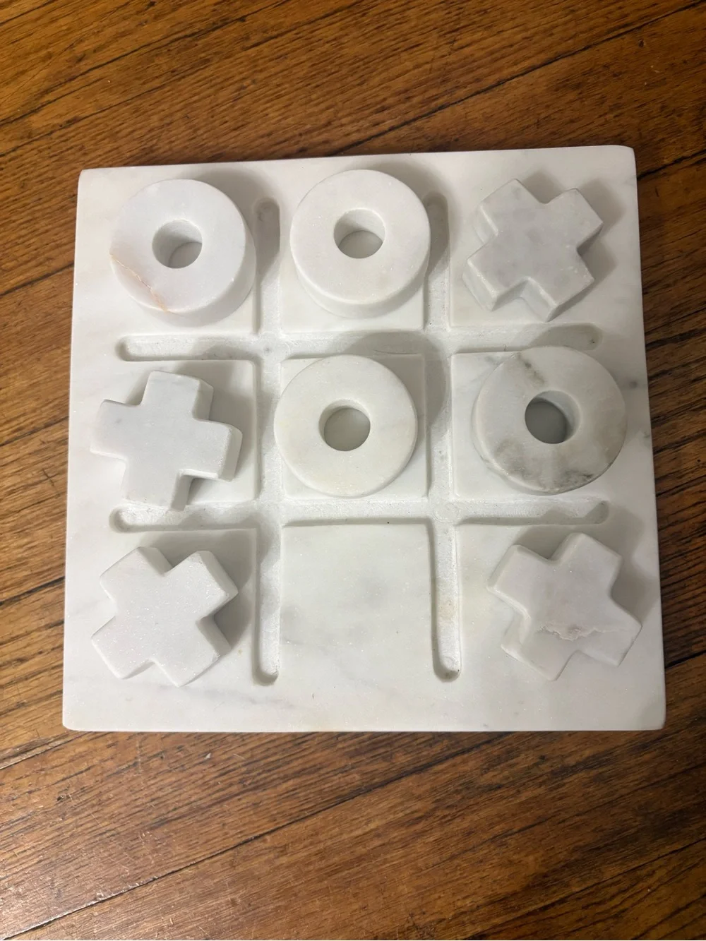 Crate&Barrel White Marble Tic Tac Toe Set with Carved X and O Pieces